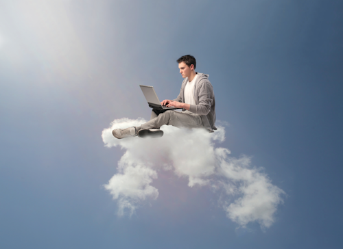 man sat on cloud