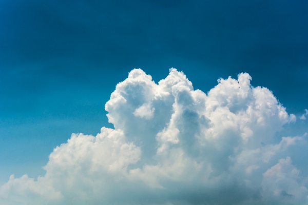 image of a cloud in a blue sky