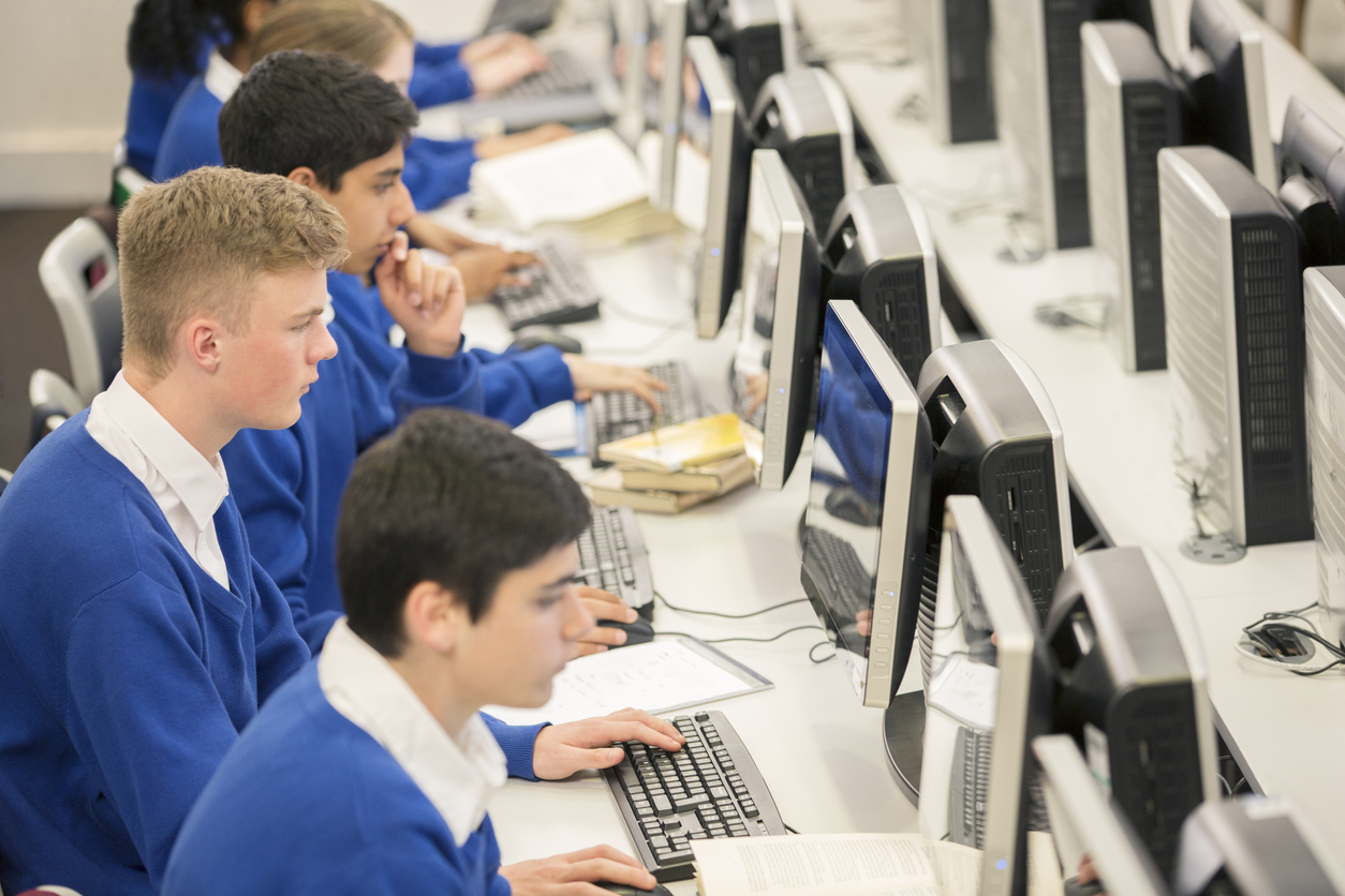 students using computers at school